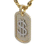 The 14K Diamond Dollar Sign Dog Tag Pendant is a gold necklace featuring a rectangular dog tag encrusted with diamonds and a raised dollar sign, showcasing the brilliance of natural diamond jewelry.