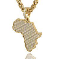 The 14k Gold Africa Map Pendant with Diamonds features a diamond-encrusted map of Africa, polished gold border, and a sparkling diamond-studded loop for added shine.