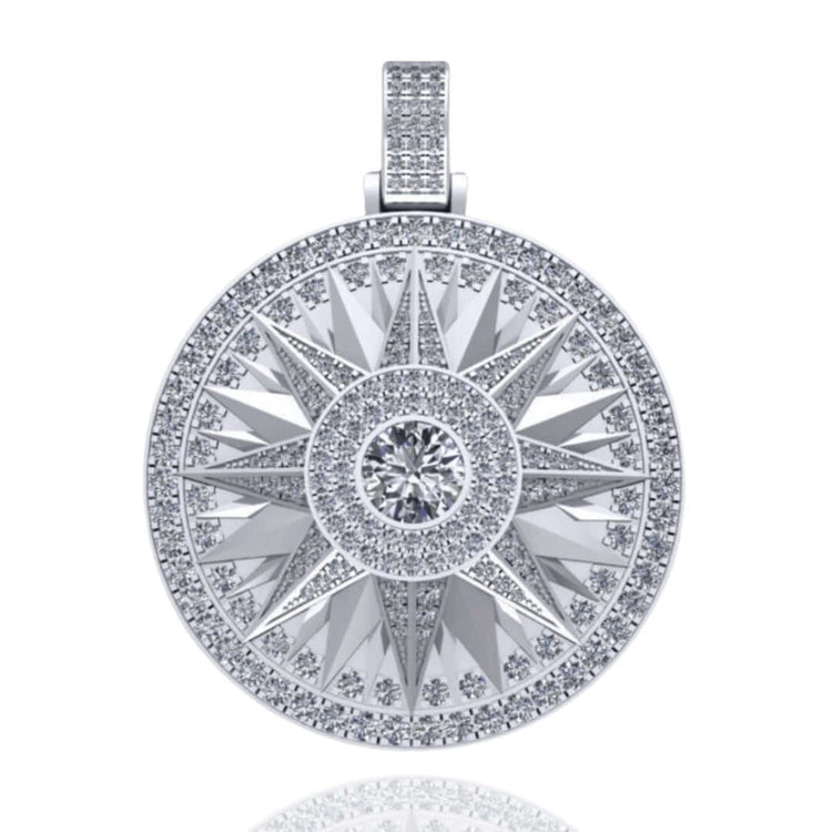 The 14k Gold Celestial Starburst Diamond Pendant features a round starburst design encrusted with diamonds along the edges, center, and bale, highlighting a large central diamond for a dazzling celestial look.