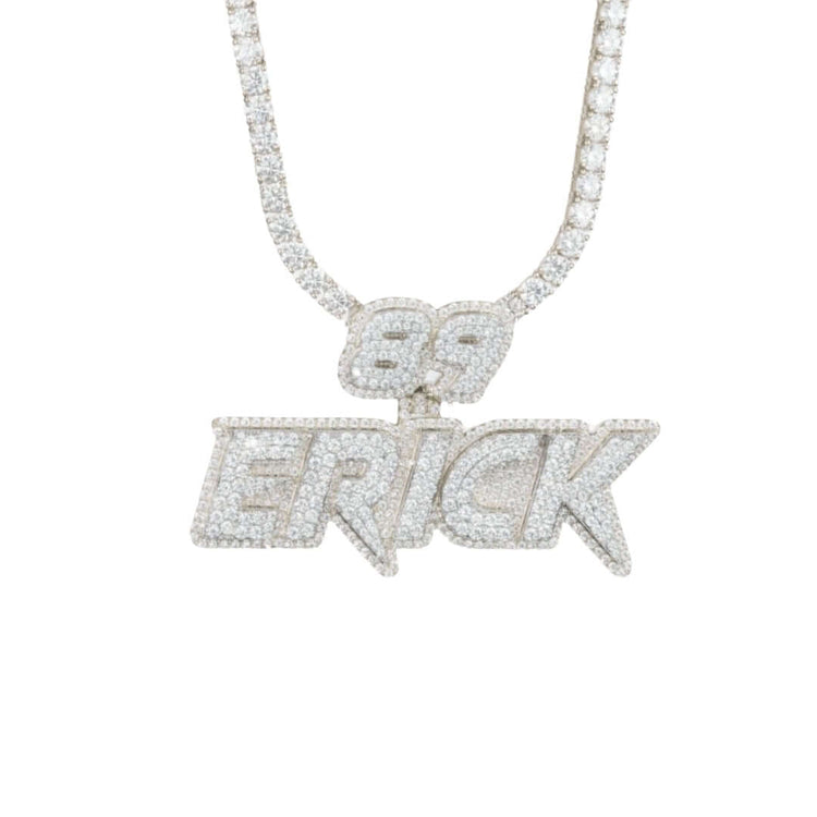 The Custom Diamond Name Pendant - Solid Yellow Gold features a diamond-encrusted necklace with “69” above “ERICK,” both in bold sparkling letters, set in dazzling 14K solid gold for a standout personalized accessory.