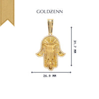 The Hamsa Hand Pendant - 10k showcases a central elephant head and sparkling stones. Crafted from zircon, it measures 31.7 mm tall by 26.9 mm wide—a unique and eye-catching addition to your jewelry collection.