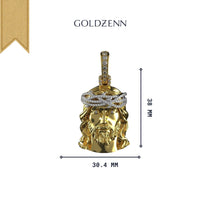 The 14K Yellow Gold Jesus Diamond Head Pendant features diamond detailing and a crown of thorns, measuring 38mm tall by 30.4mm wide. Displayed on a white background with the GOLDZENN brand name, it's perfect for religious jewelry lovers.