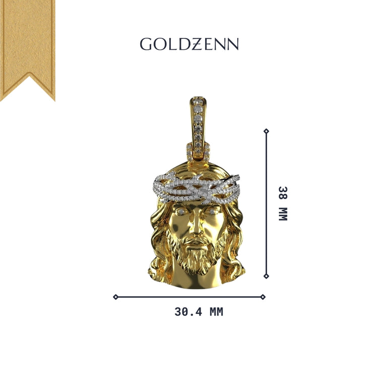 The 14K Yellow Gold Jesus Diamond Head Pendant features diamond detailing and a crown of thorns, measuring 38mm tall by 30.4mm wide. Displayed on a white background with the GOLDZENN brand name, it's perfect for religious jewelry lovers.