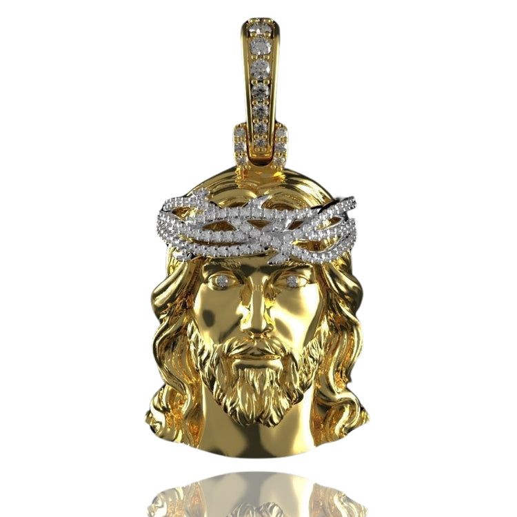 The 14K Yellow Gold Jesus Diamond Head Pendant features Jesus' head with a long beard and hair, a diamond-encrusted crown of thorns, and diamond accents on the bail—an elegant religious jewelry piece shown on a white background.
