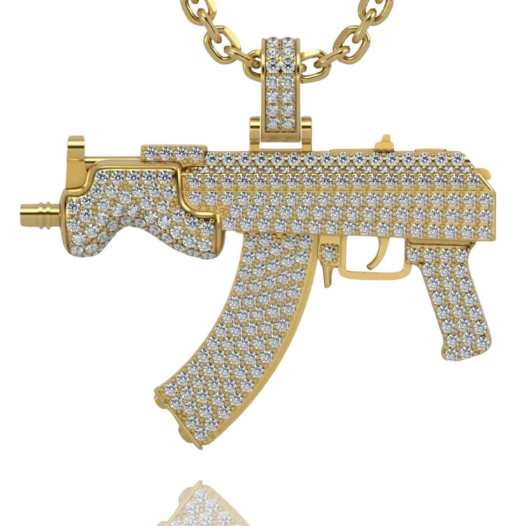 The Diamond Mini Draco Gun Pendant - 14k is a men's gold accessory, crafted from 14K gold and set with sparkling diamonds, showcased against a white background for a bold and detailed look.