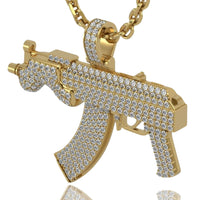 The Diamond Mini Draco Gun Pendant - 14k is a men's gold pendant necklace, featuring a mini Draco gun design with sparkling clear gemstones for a bold, standout look.