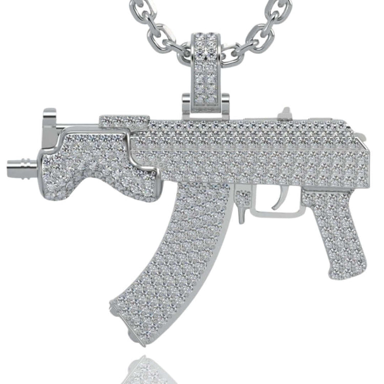 The Diamond Mini Draco Gun Pendant - 14k is a striking men's gold pendant shaped like a mini assault rifle, encrusted with sparkling stones—perfect for those who want to make a statement.