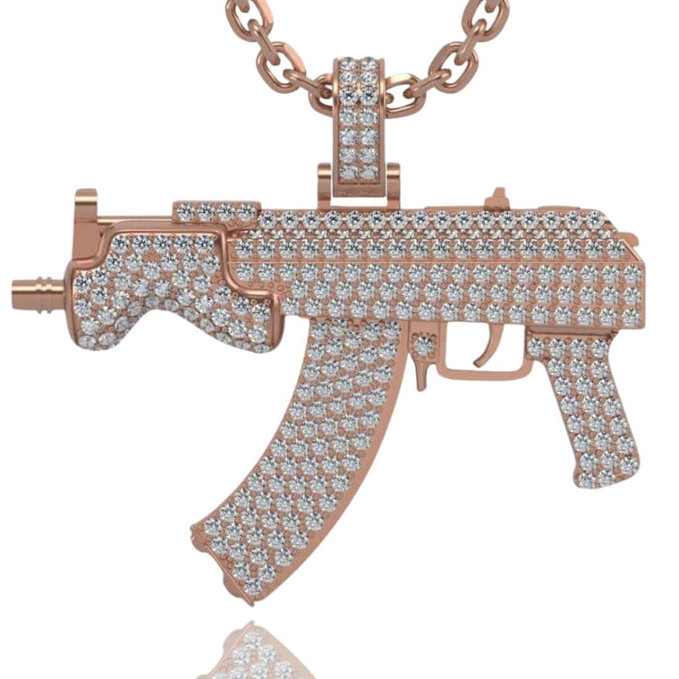 Introducing the Diamond Mini Draco Gun Pendant - 14k: a men’s gold necklace featuring a detailed assault rifle design, encrusted with sparkling diamonds, capturing the bold style of a diamond mini Draco gun.