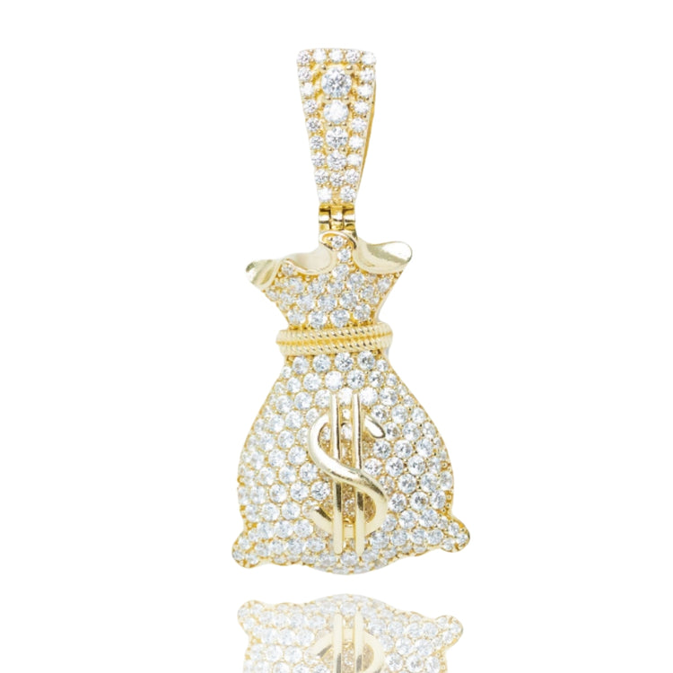 The Money Bag Pendant in 10K Gold with CZ is a bold men's gold pendant featuring a sparkling dollar sign and a decorative, CZ-studded bail for extra shine.