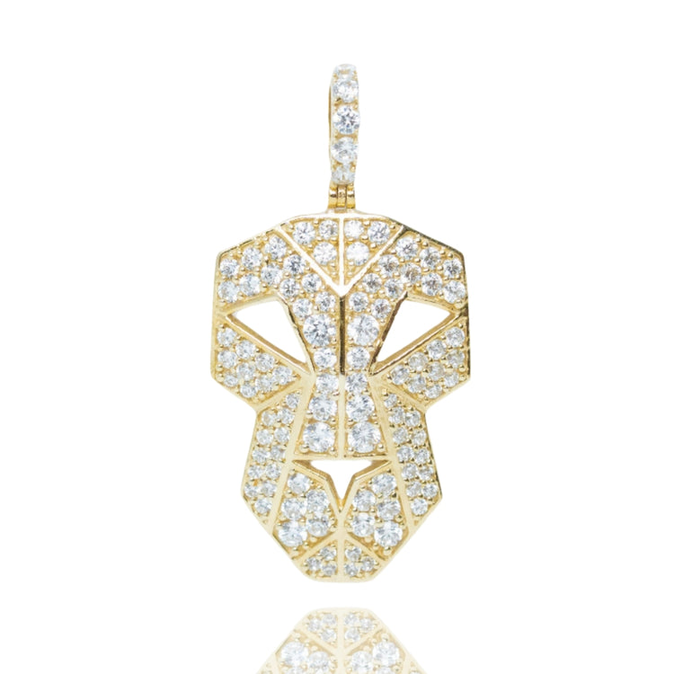The Edge Mask Pendant in 10k Solid Gold is a bold men’s accessory, featuring a unique mask design and shimmering diamonds for a striking look.