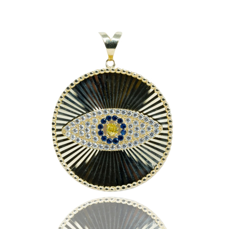 The Eye Pendant – 10k features a striking eye motif with blue, yellow, and white gemstones, set against a textured radiating background and scalloped border—a standout piece in men's jewelry.