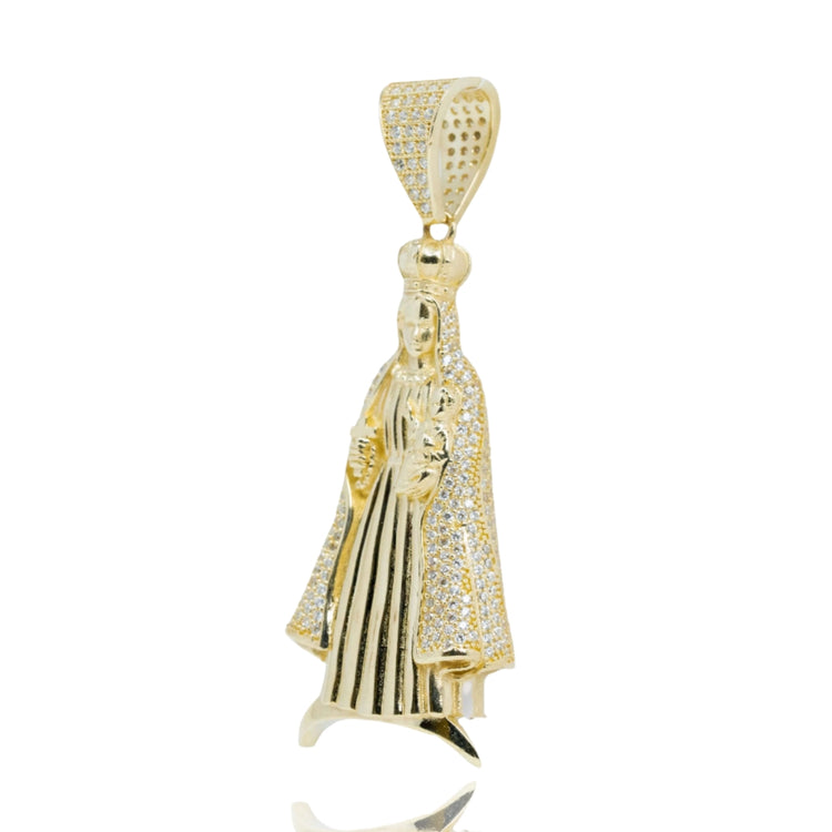 The Lady of Charity Pendant – 10K Gold with CZ Stones features a crowned, robed figure holding a child, both sparkling with CZ accents for an ornate, jeweled look in this striking gold men’s pendant.