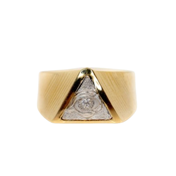The All Seeing Eye Ring in Solid Gold features a triangular face with a silver All Seeing Eye design and a central diamond, displayed against a plain white background.