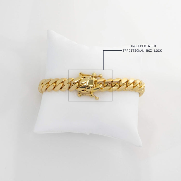 7mm Handmade Miami Cuban Link Bracelet in solid yellow gold with the included traditional box lock.