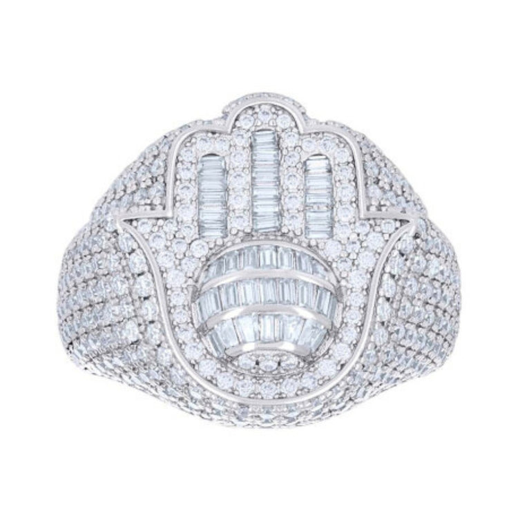 The Baguette Moissanite Hamsa Symbol Religious Ring features a stylized Hamsa hand design in sterling silver, adorned with sparkling moissanite baguettes—blending elegance with meaningful symbolism.