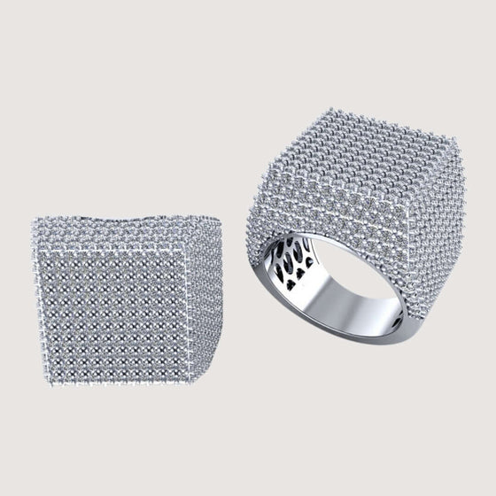 Cube Pavé Diamond Ring – 5.50 CT Men's Gold Design The Cube Pavé Diamond Ring – 5.50 CT Men's Gold Design is a bold and modern statement piece for those who want to stand out. Featuring an innovative cube-like structure encrusted with 5.50 CT of lab-grown