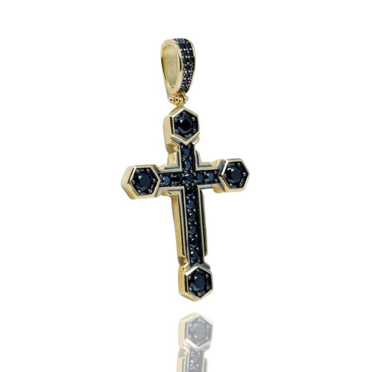 Black Cross with CZ Pendant – 10K Gold for Men features hexagonal edges and multiple black gemstones on the front and bail, displayed on a white background with a subtle reflection.