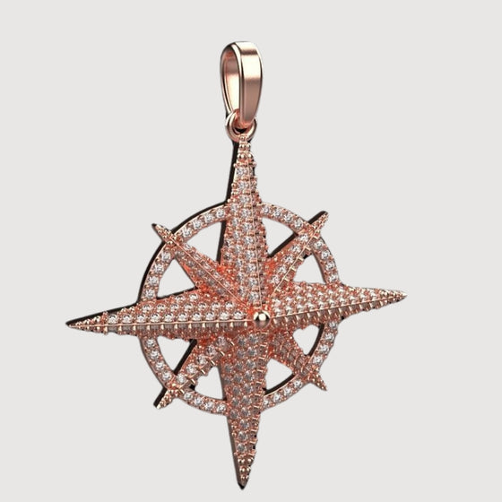 14k Gold Diamond Compass Star PendantEmbrace adventure with the 14K Gold Diamond Compass Star Pendant. Features a compass star motif in radiant 14K gold with sparkling diamond accents for timeless elegance.