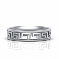 The 14k Gold Men's Greek Key Band Ring features a silver Greek key design engraved around the band, showcased on a white background with a subtle reflection—an elegant twist on the classic men's ring.