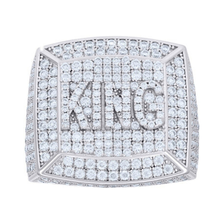 The Moissanite KING Square Head Fashion Ring features a bold KING engraving outlined with diamonds on a wide, sparkling square face, creating a luxurious and eye-catching design.