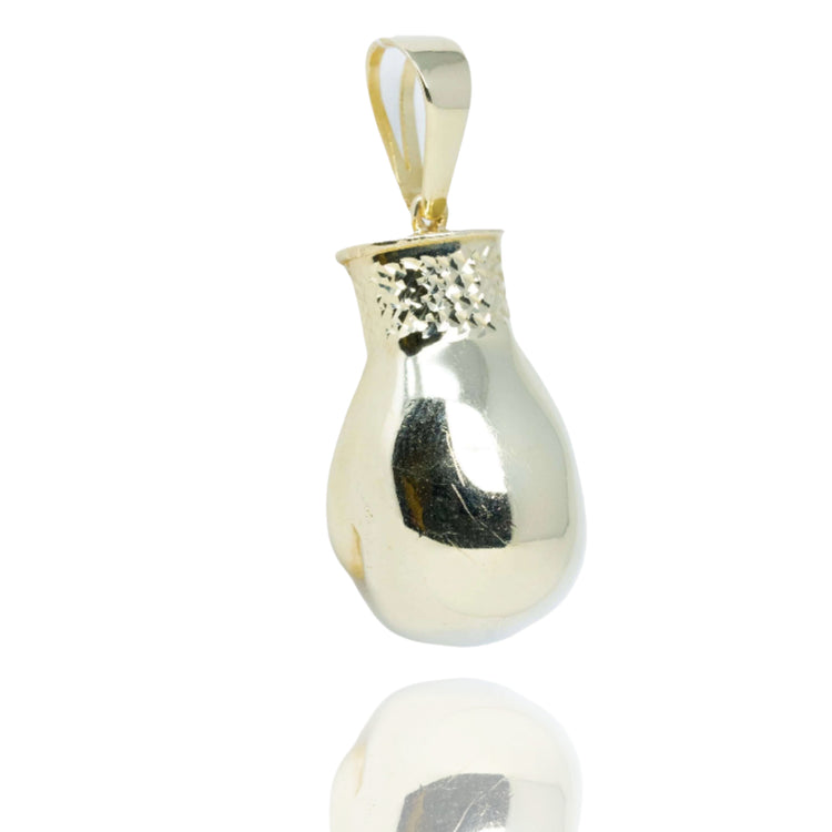The Boxing Glove Pendant - 10k Gold showcases a polished, reflective finish with a textured band near the opening, displayed against a white background—a striking addition to boxing jewelry collections.