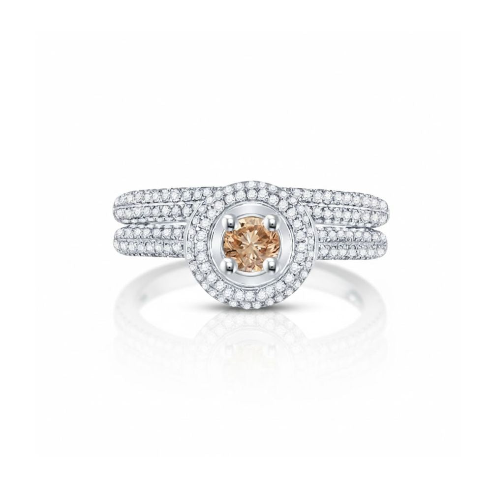 The 14k Yellow Gold Brown Diamond Bridal Engagement Ring Set features a champagne-hued center stone, two halos of white diamonds, and a triple-band diamond shank—making it a timeless wedding ring choice.