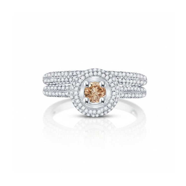 The 14k Yellow Gold Brown Diamond Bridal Engagement Ring Set features a champagne-hued center stone, two halos of white diamonds, and a triple-band diamond shank—making it a timeless wedding ring choice.
