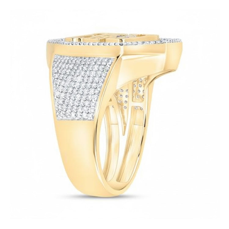 The 10k Gold 7/8 CTTW Diamond Cross Men’s Ring features a bold yellow gold band and a rectangular top adorned with rows of brilliant white diamonds, detailed with an intricate cross design on the sides.