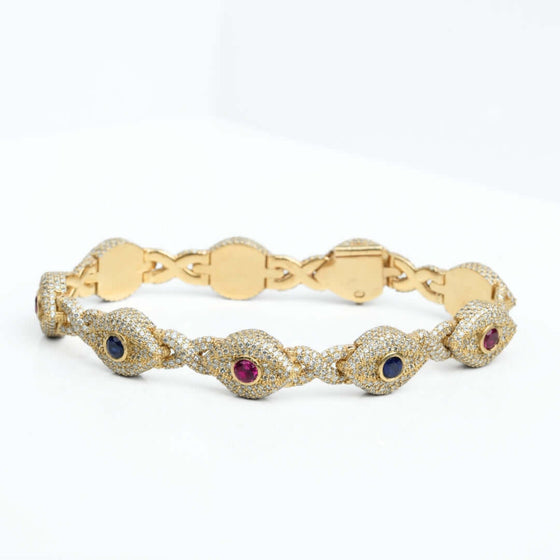 Diamond Evil Eye Gemstone Bracelet - 10k Gold Dazzling 13ct diamond evil eye bracelet in 10k yellow gold. VS clarity natural diamonds for protection & luxurious style. Shop this 8" statement piece!