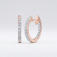 10K Gold Diamond Inside Outside Hoop Earrings 1/4 Cttw featuring sparkling white diamonds, displayed on a simple light background.