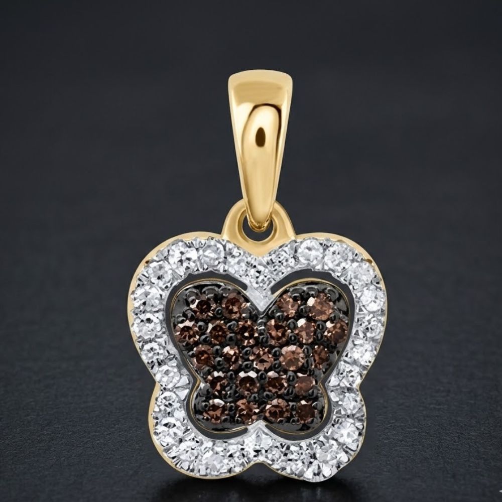The 1/5CTW-DIA P1 GIFT COGNAC NATURAL DIAMOND BUTTERFLY PENDANT features a 10k gold butterfly with cognac natural diamonds at the center and a sparkling clear stone border, beautifully shown against a dark background.