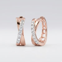 Experience timeless elegance with the 10k Gold Round Diamond Hoop Earrings – 1/6 Cttw, featuring a stylish crisscross design and a row of sparkling diamonds reminiscent of classic hoop earrings.