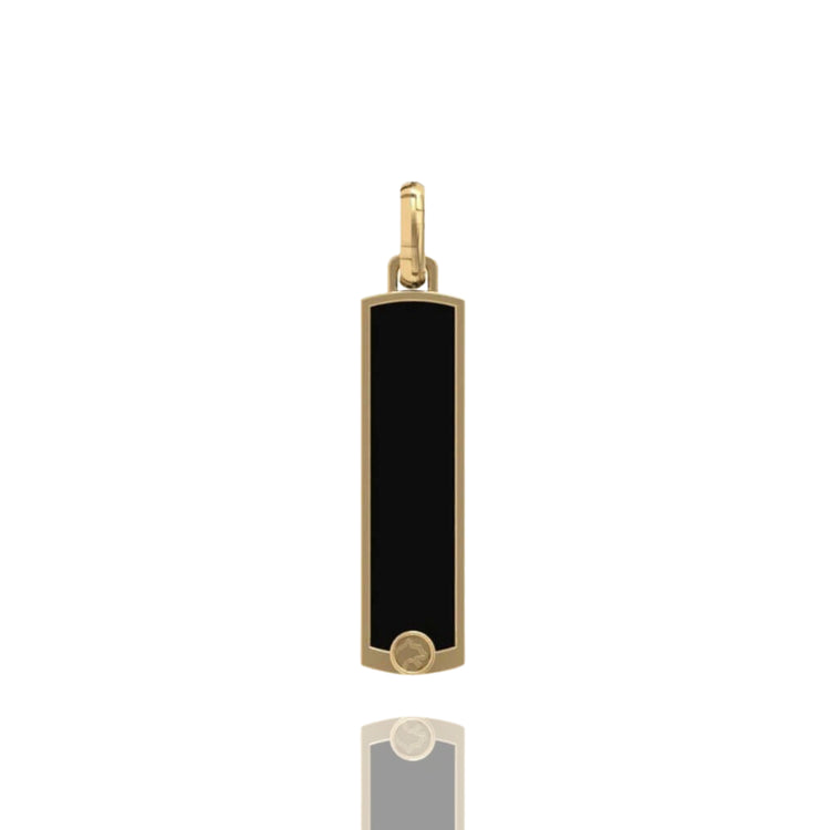 The 14k Gold Black Enamel Tag Pendant features a rectangular shape, black enamel center, and a small gold circle at the bottom, shown on a white background with a subtle reflection.