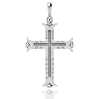 The 14k Gold Ornate Cross Pendant features pointed, flared ends, a textured center, grooved arm details, and a polished bail for easy attachment to a necklace.