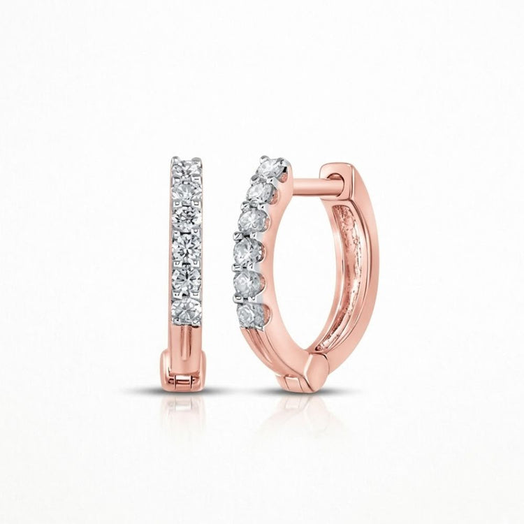 The 10k Gold Round Diamond Hoop Earrings feature a row of sparkling white diamonds set along the front, shown on a plain white background.