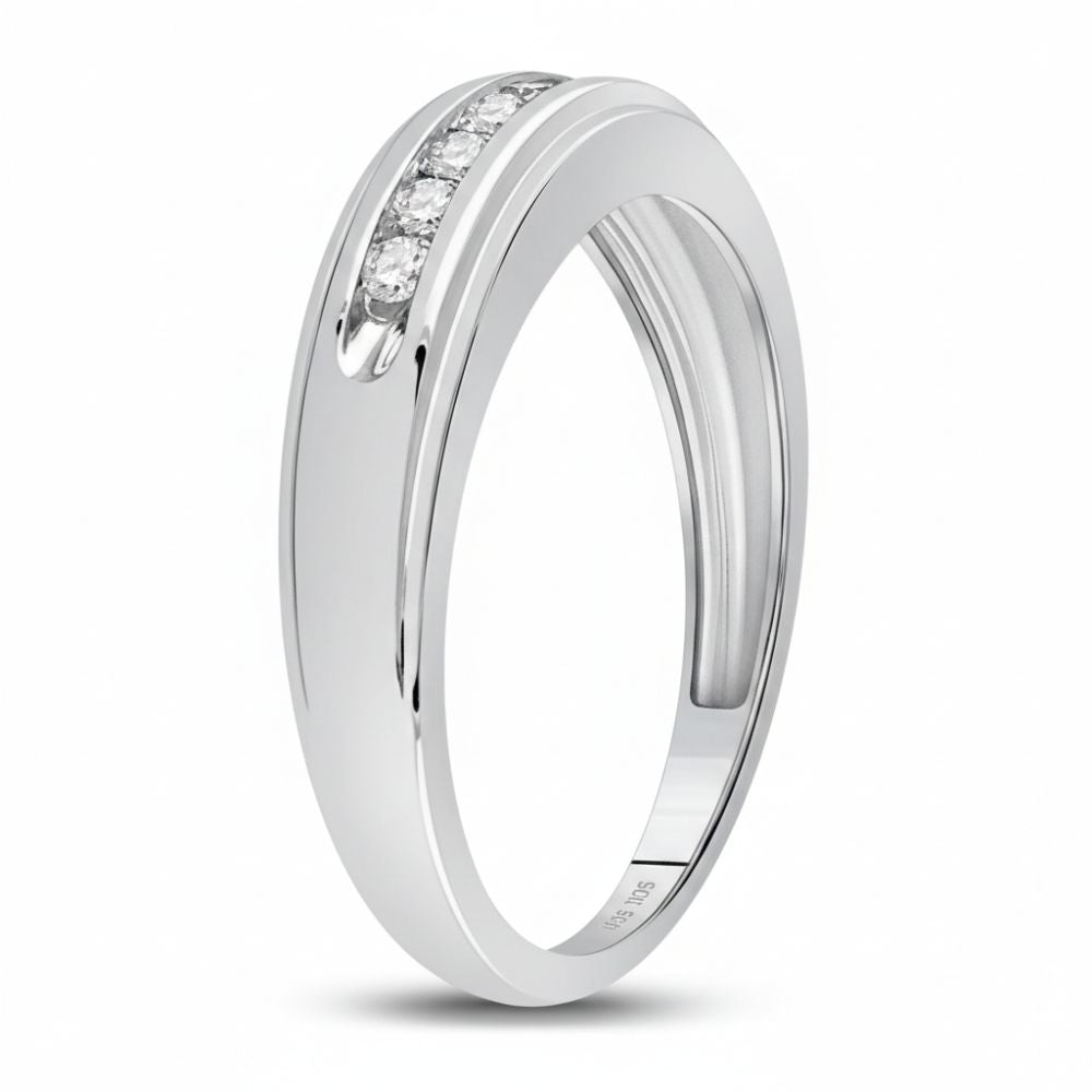 The 10k White Gold Round Diamond Wedding Band 1/4 Cttw features three small, round diamonds set in a smooth, slightly curved band, shown against a plain white background.
