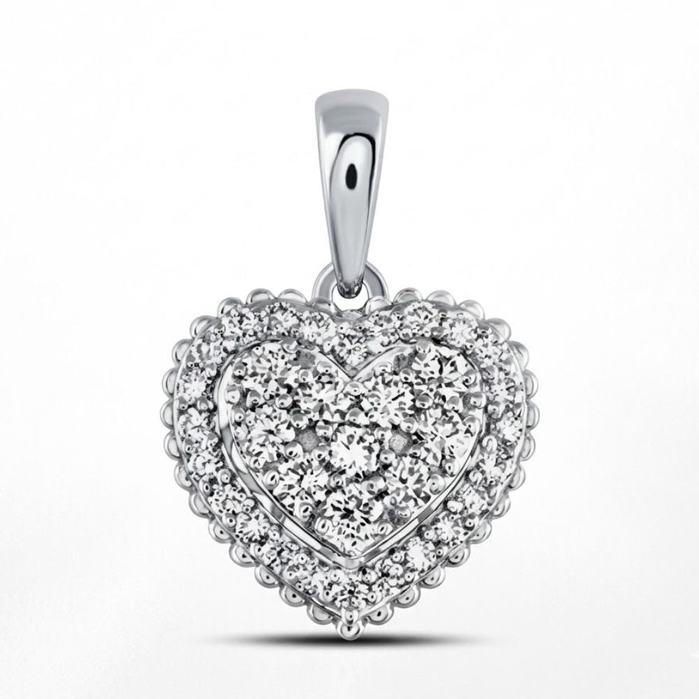 The 1/2 CTW Diamond Heart Pendant in 14K Gold features a heart-shaped design encrusted with sparkling diamonds, scalloped edges, and a polished bail, shown against a plain white background.