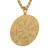 The 14k Gold Viking Pendant features a round medallion engraved with runic symbols and a compass-inspired design, hanging on a twisted gold chain—a perfect accessory for fans of Norse jewelry.