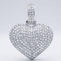 The 10K Gold Diamond Heart Pendant 3/4 Cttw Charm, set with rows of sparkling diamonds, shines elegantly against a plain light gray background.