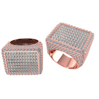 The Iced-Out Square Baguette Signet Ring – 7.20 CT features a bold, square shape and is encrusted with rows of sparkling diamonds on the top and sides—a standout piece of men’s jewelry, shown against a white background.