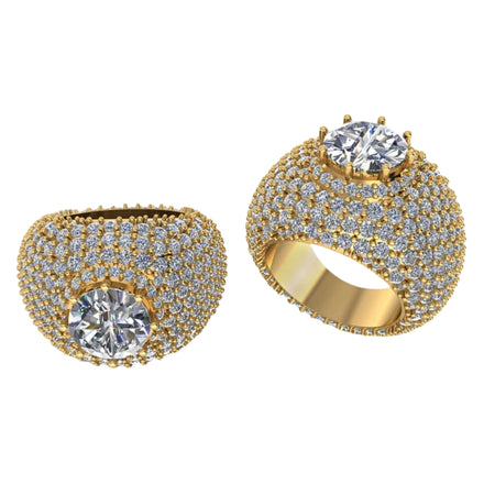 The Domed Solitaire Diamond Ring – 15.21 CT Gold Design features a bold round center diamond, set among pavé diamonds on an ornate gold band, beautifully showcased on a white background.
