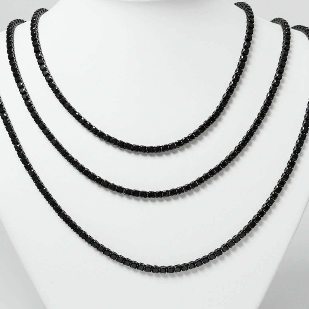 alt=" Explore our 3mm Black Moissanite Tennis Chain, featuring round-cut black moissanite gemstones set in 925 sterling silver. A perfect blend of elegance and modern style. "