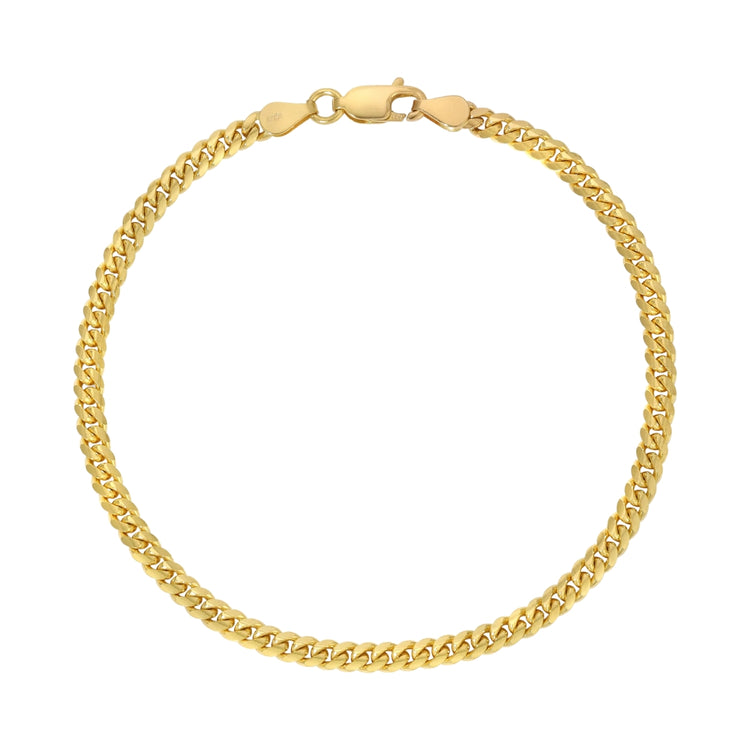 The Cuban Link Bracelet - 3mm features a secure clasp and classic gold design, adding timeless elegance to any look.
