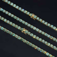A Green Moissanite Tennis Bracelet - 4mm shines on a black background, highlighting its sparkling stones and exquisite craftsmanship.