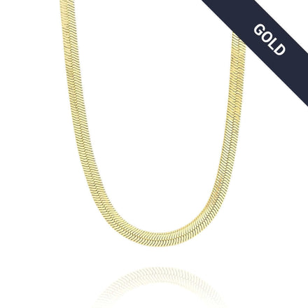 The Herringbone Chain - 4mm is displayed on a white background with a dark diagonal GOLD banner in the top right. This elegant 14K gold chain features a stylish, tarnish-resistant finish.