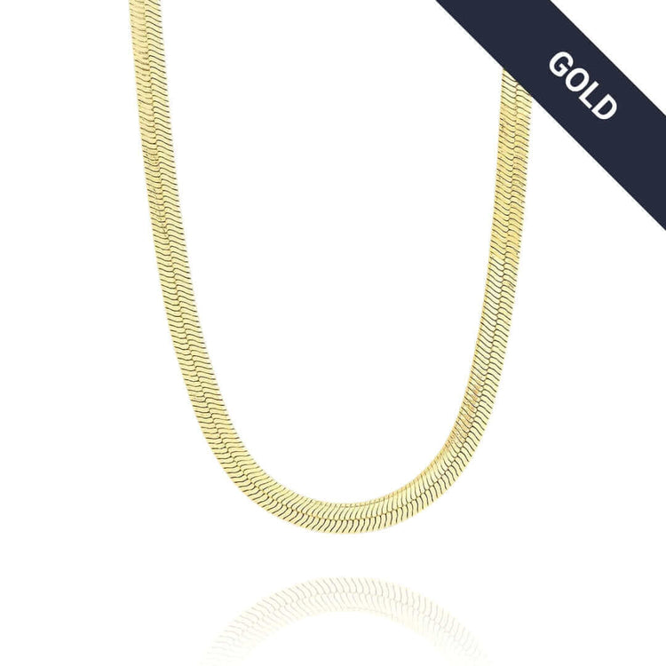 The Herringbone Chain - 4mm is displayed on a white background with a dark diagonal GOLD banner in the top right. This elegant 14K gold chain features a stylish, tarnish-resistant finish.