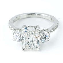  alt=" Discover the 4.84 CTW Three Stone Radiant Engagement Ring. Featuring lab-grown radiant-cut diamonds and a sleek 14K white gold band, it’s a timeless women’s ring. "