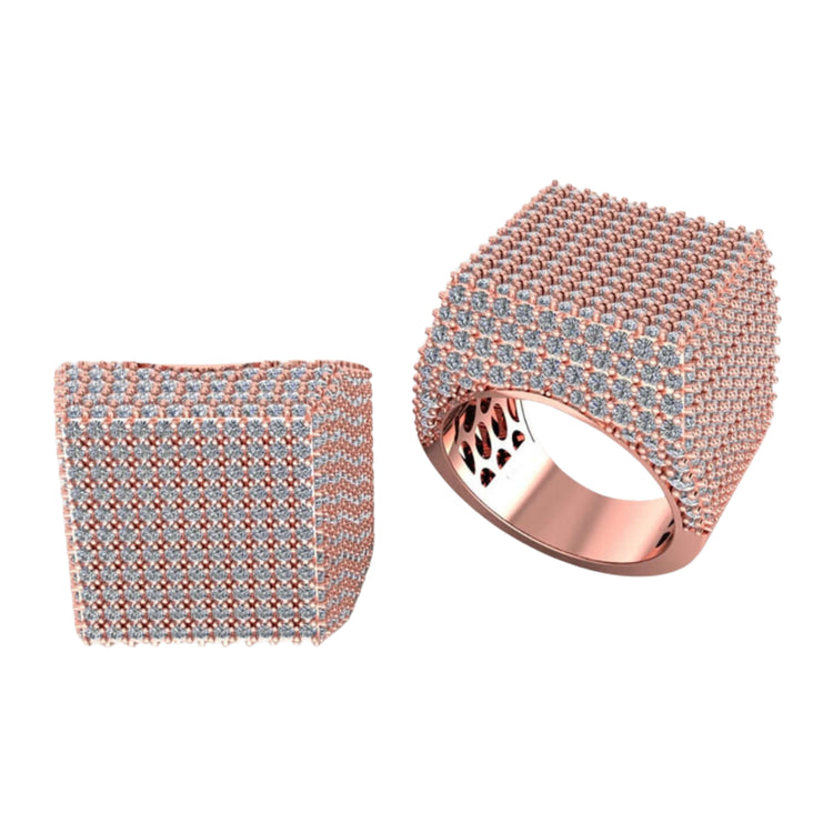 The Cube Pavé Diamond Ring – 5.50 CT Men's Gold Design features square shapes with pavé-set stones on rose gold bands, creating a textured, modern geometric look. One ring stands upright while the other rests on its side.