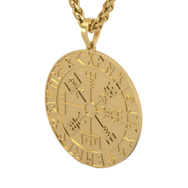 The 14k Gold Viking Pendant features engraved runes along its edge, a central compass-like design, and hangs from a twisted gold chain—a bold statement piece of Norse jewelry.