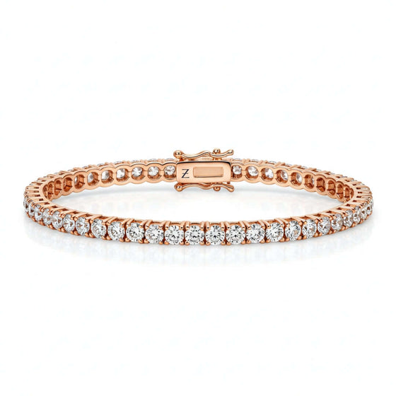 Tennis Bracelet - 14k Gold Moissanite 14K gold tennis bracelet with D color, VVS moissanite stones. Available in yellow, white, or rose gold. Brilliant, ethical, and crafted to perfection.